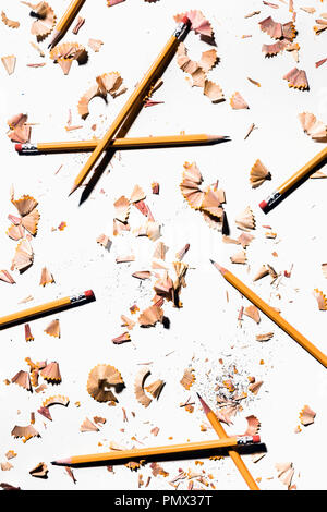 Pencils and shavings on white background Stock Photo