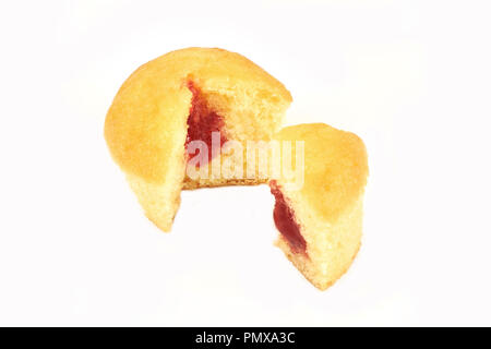 Two parts of muffins,close-up. Isolated on white background. Stock Photo