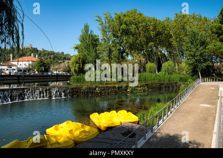 Tomar, Santarem district, Portugal. The Nabao River flowing through a park in the historical centre of the city Stock Photo
