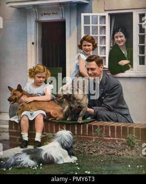 George the sixth with his wife Queen Elizabeth and their daughters princess Elizabeth and princess Margaret at Y Bwthyn Bach (the little house) in 1937 which was gifted by the people of Wales to princess Elizabeth. Stock Photo