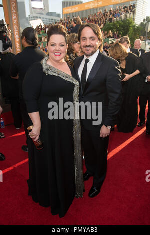 Actress Melissa McCarthy and director Ben Falonce attend the 71st Annual Golden Globes Awards at the Beverly Hilton in Beverly Hills, CA on Sunday, January 12, 2014.  File Reference # 32222 140JRC  For Editorial Use Only -  All Rights Reserved Stock Photo
