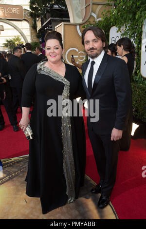 Actors Melissa McCarthy and Ben Falcone attend the 71st Annual Golden Globes Awards at the Beverly Hilton in Beverly Hills, CA on Sunday, January 12, 2014.  File Reference # 32222 147JRC  For Editorial Use Only -  All Rights Reserved Stock Photo