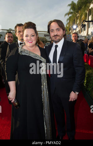 Melissa McCarthy and Ben Falcone attend the 71st Annual Golden Globes Awards at the Beverly Hilton in Beverly Hills, CA on Sunday, January 12, 2014.  File Reference # 32222 183JRC  For Editorial Use Only -  All Rights Reserved Stock Photo