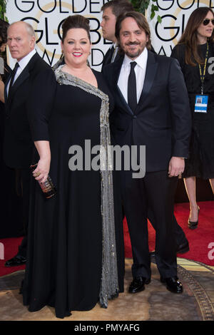 Actress Melissa McCarthy and director Ben Falonce attend the 71st Annual Golden Globes Awards at the Beverly Hilton in Beverly Hills, CA on Sunday, January 12, 2014.  File Reference # 32222 235JRC  For Editorial Use Only -  All Rights Reserved Stock Photo
