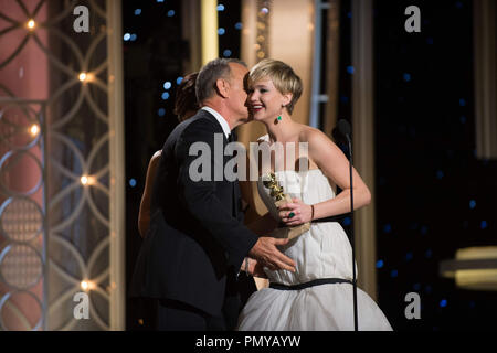 https://l450v.alamy.com/450v/pmyayw/jennifer-lawrence-right-accepts-the-golden-globe-award-for-best-performance-by-an-actress-in-a-supporting-role-in-a-motion-picture-for-her-role-in-american-hustle-from-tomhanks-and-sandra-bullock-at-the-71st-annual-golden-globe-awards-at-the-beverly-hilton-in-beverly-hills-ca-on-sunday-january-12-2014-file-reference-32222-496jrc-for-editorial-use-only-all-rights-reserved-pmyayw.jpg