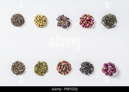 lines of dried herbal organic tea isolated on white Stock Photo
