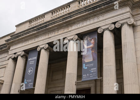 Liverpool Wirral Port Sunlight Village The Lady Lever Art Gallery banners signs exhibition neo-classical columns pillars balustrade detail Stock Photo