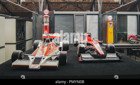 BERLIN, GERMANY-JULY 30, 2016: 1978 McLaren M26 F1 (James Hunt) and 2013 F1 Marussia MR02 (Max Chilton, Jules Bianchi) in the Classic Remise Stock Photo
