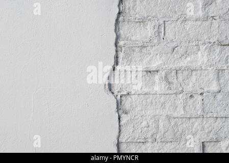 white brick wall plastered and painted background texture Stock Photo