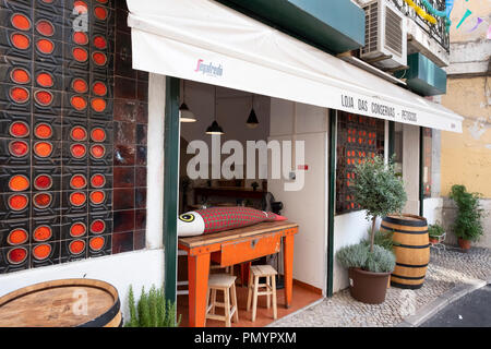 Restaurant with large fabric fish on table Lisbon Stock Photo