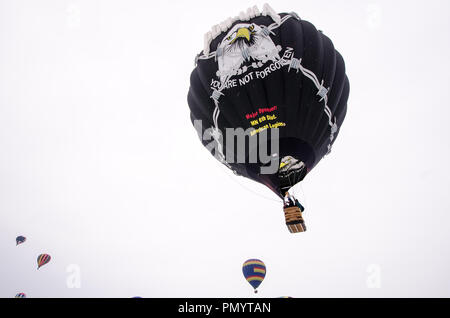 Vietnam veterans hot air balloon launches into the sky. POW-MIA war logo on the balloon Stock Photo