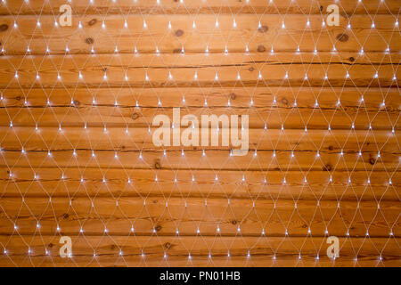led light bulbs decoration on wooden walls. holiday concept Stock Photo