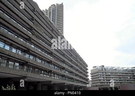 Balconies on low rise Barbican Estate apartments and tower in the City of London England UK  Great Britain  KATHY DEWITT Stock Photo