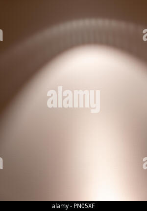 Patterns on wall cast by light onto painted wall. Stock Photo