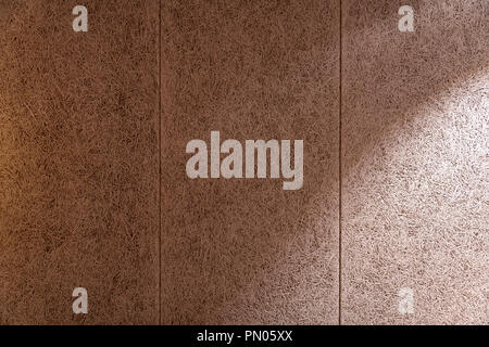 Halo of light on painted sheets of wood fibre cement board. Would be useful for a background image. Stock Photo