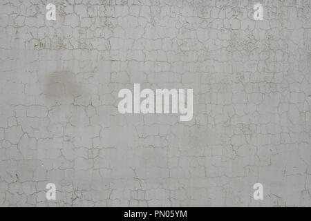 Peeling, faded and cracked paint on a wall in Stavanger, Norway Stock Photo