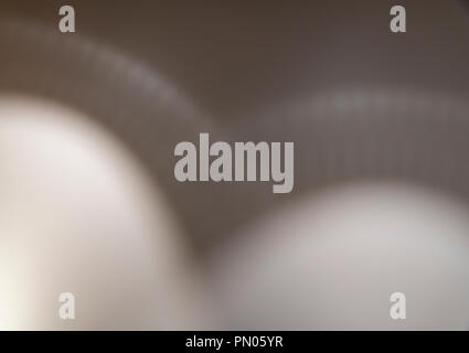 Patterns on wall cast by light onto painted wall. Stock Photo