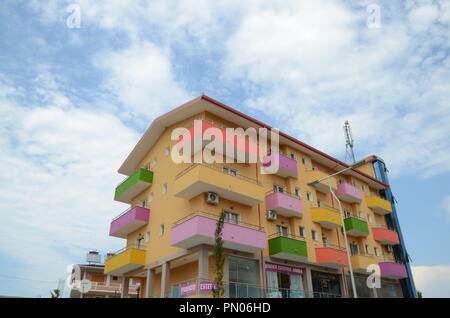 brightly painted housing in divjake west albania Stock Photo