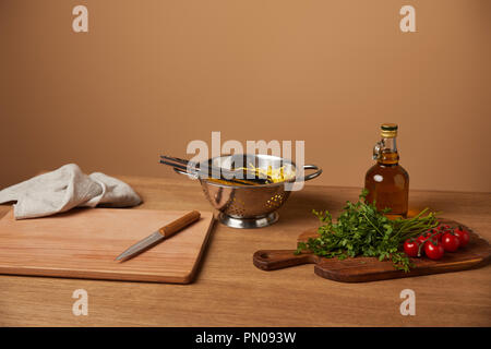 Italian Tomatoes In A Colander On Table. Cooking With Tomatoes Concept 