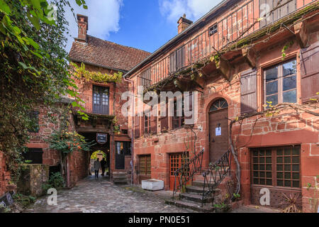 France, Correze, Dordogne Valley,  Collonges la Rouge, labelled Les Plus Beaux Villages de France (The Most Beautiful Villages of France), alleyway // Stock Photo