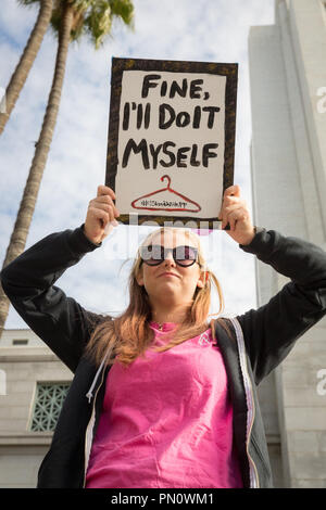 Protester with pro-choice sign at Women's March in Los Angeles, in 2017. Stock Photo