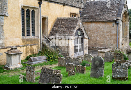 All Saints church and churchyard in the village of North Cerney, Gloucestershire, England Stock Photo