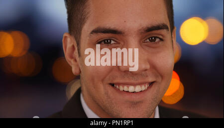 Portrait of attractive businessman in urban setting with pretty bokeh lights Stock Photo