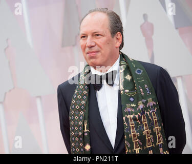 Hans Zimmer, Oscar® nominee for Achievement in Original Score for work on 'Interstellar' arrives with guest for the live ABC Telecast of The 87th Oscars® at the Dolby® Theatre in Hollywood, CA on  Sunday, February 22, 2015.  File Reference # 32566 068THA  For Editorial Use Only -  All Rights Reserved Stock Photo