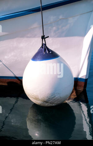 Nautical fenders on the ropes . Mooring buoys mooring for ports and ...