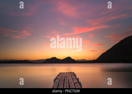 Golden hour sunset on a deck Stock Photo