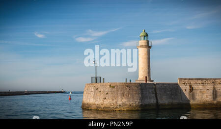 Josephine tower lighthouse or Vieux Mole tower in the port of Saint Gilles Croix de Vie in France Stock Photo