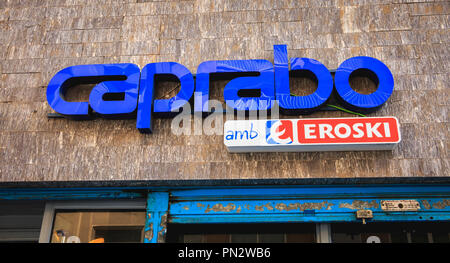 Barcelona, Spain - June 20, 2017: Detail of the sign of a grocery store Caprabo, a subsidiary of Eroski, a company and a sign of the Basque retail sec Stock Photo