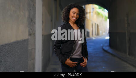 Beautiful African American woman with short curls posing for portrait Stock Photo