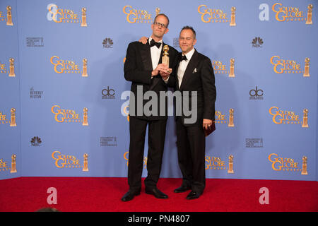 For BEST ANIMATED FEATURE FILM, the Golden Globe is awarded to 'The Peanuts Movie,' directed by Steve Martino. Pete Docter and Jonas Rivera pose with the award backstage in the press room at the 73rd Annual Golden Globe Awards at the Beverly Hilton in Beverly Hills, CA on Sunday, January 10, 2016. Stock Photo