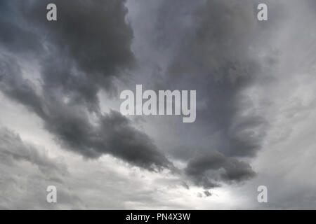 Dark gray storm clouds covering the sky Stock Photo