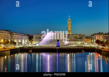 Le Havre (northern France): the port at night with the concert hall 'Le Volcan', the arts centre 'Espace Oscar Niemeyer' and St Joseph's Church, Perre Stock Photo