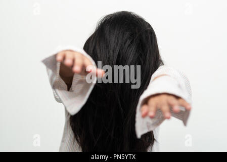 Long hair ghost with hiding face, holloween concept. Stock Photo