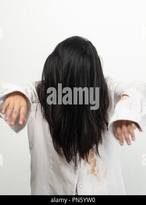 Long hair ghost with hiding face, holloween concept. Stock Photo