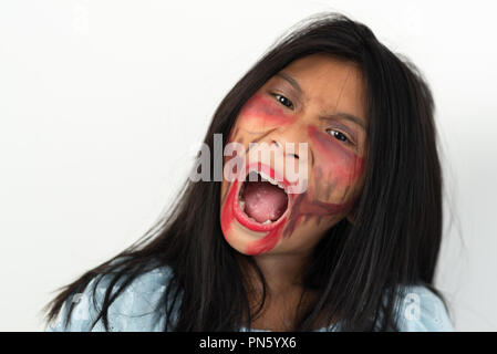 Girl in long hair zombi ghost with holloween concept. Stock Photo