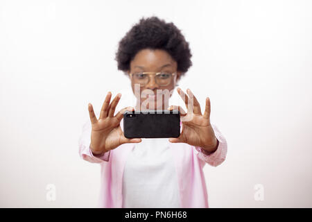 awesome smiling africaan hipster girl trying to make a good photo Stock Photo