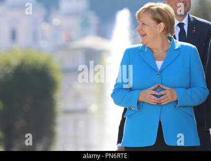 Salzburg, Austria. 20th Sep, 2018. German Chancellor Angela Merkel reacts at a family picture during the informal EU summit in Salzburg, Austria, Sept. 20, 2018. European Union (EU) leaders on Wednesday kicked off a two-day informal summit in the Austrian city of Salzburg, focusing on the controversial issues of migration and Brexit. Credit: Ye Pingfan/Xinhua/Alamy Live News Stock Photo