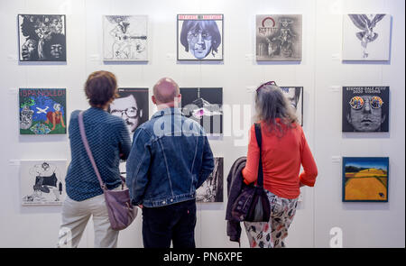 20 September 2018, Hamburg: Visitors to the Reeperbahn Festival look at the exhibition: 'Klaus Voormann - It all started in Hamburg' by Voormann, known as the fifth Beatle, designed record cover. The music festival will take place from 19 to 22 September in the Hanseatic city. Photo: Axel Heimken/dpa Stock Photo