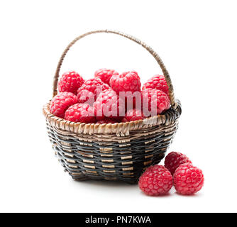 Fresh  raspberries in a small wicker basket Stock Photo