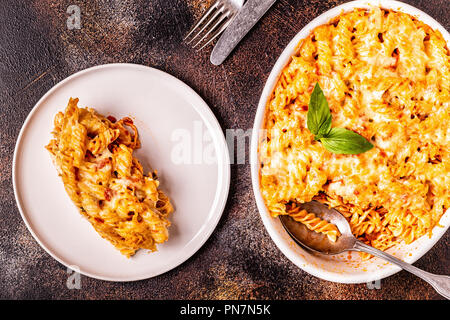 Mac and cheese, pasta baked with cheese sauce, top view.