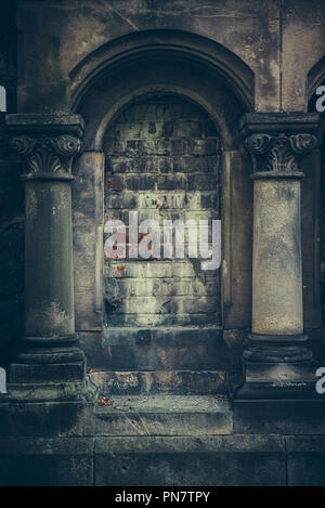 Old grunge stone wall texture and pattern background for halloween design and text Stock Photo