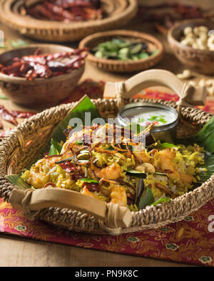 South Indian prawn biryani. Spicy shrimp and rice dish. India Food Stock Photo