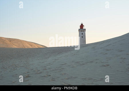 Rubjerg Knude Lighthouse - an abandoned lighthouse slowly being reclaimed by the shifting sands on the North Sea coast near Lokken, Hjorring, Denmark. Stock Photo