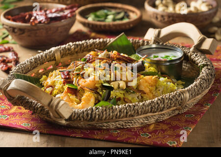 South Indian prawn biryani. Spicy shrimp and rice dish. India Food Stock Photo