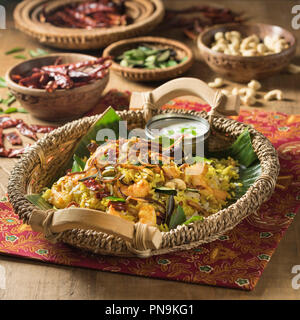 South Indian prawn biryani. Spicy shrimp and rice dish. India Food Stock Photo