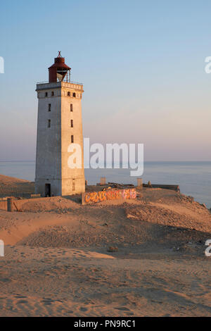 Rubjerg Knude Lighthouse - an abandoned lighthouse slowly being reclaimed by the shifting sands on the North Sea coast near Lokken, Hjorring, Denmark. Stock Photo